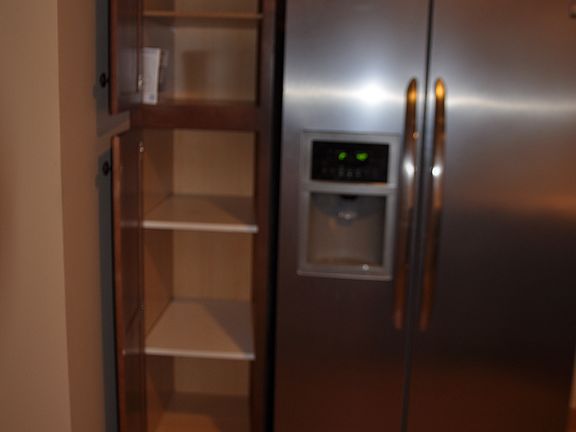 pantry nect to refrigerator