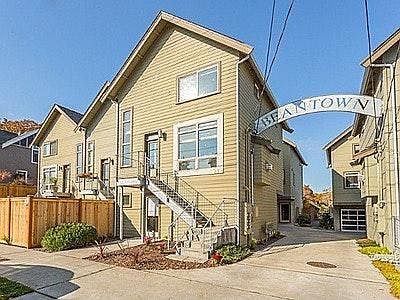 Front of house, now with fence and paver patio