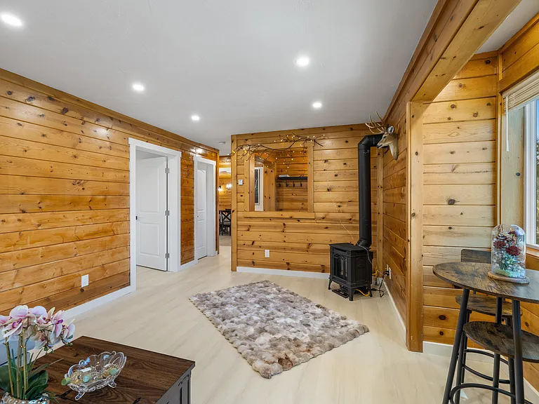 One of two living areas with gas fireplace.