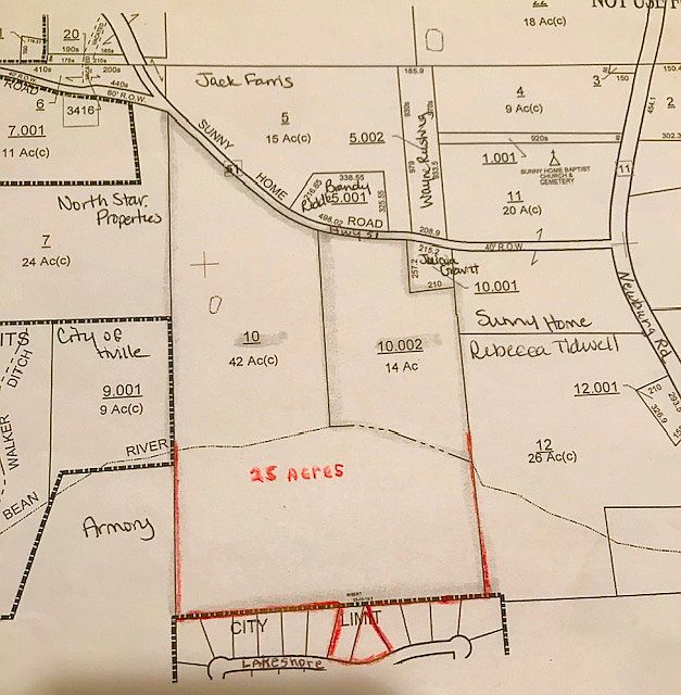 Land includes 2 lots in city