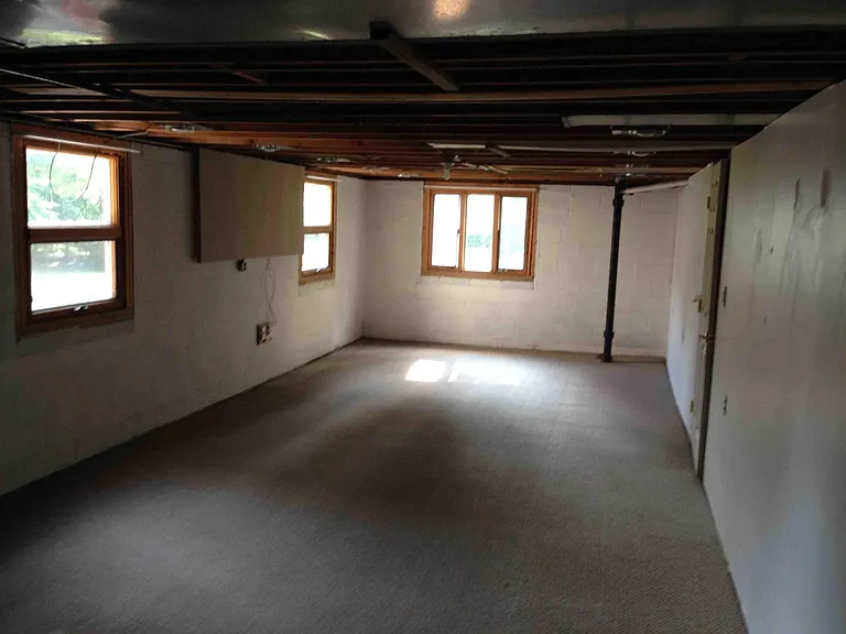 Large unfinished basement, great for storage, exercise equipment, etc.