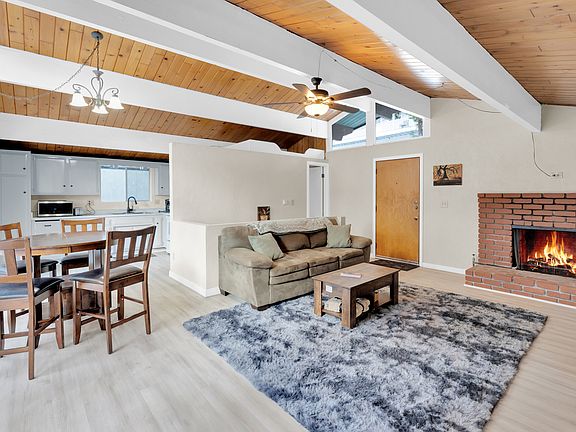 Main floor living room, dining and kitchen with full bath.