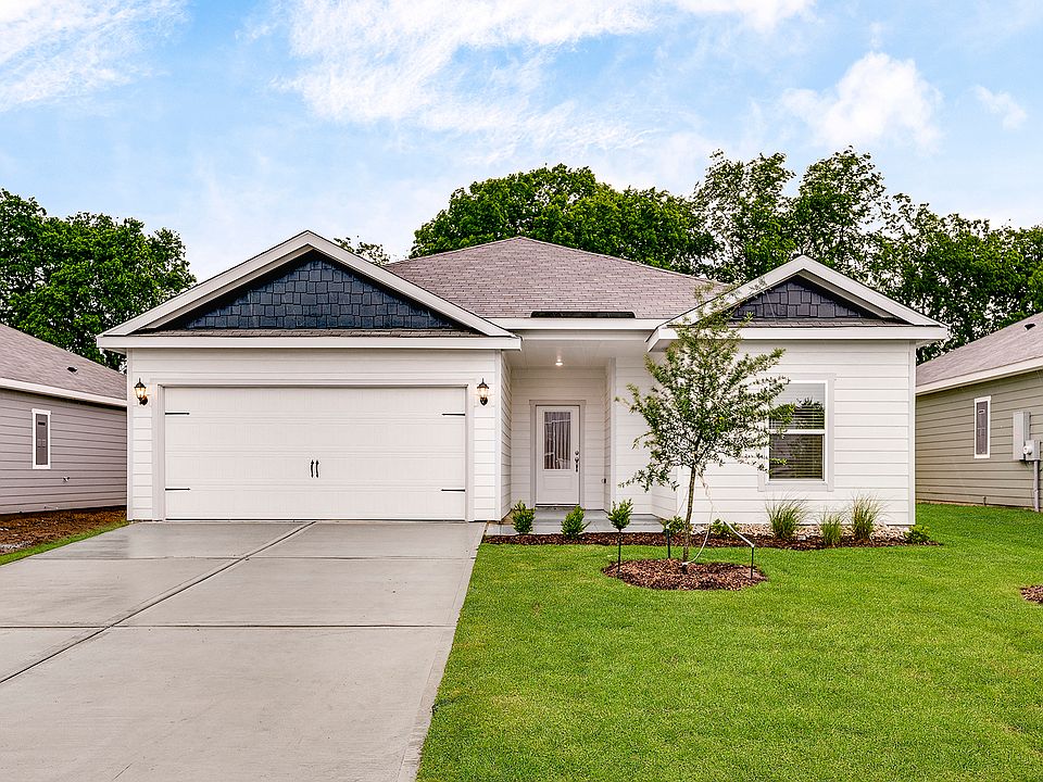 The Reed is a beautiful one-story, siding home.