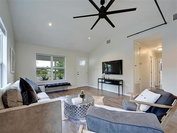 The great room is the focal point of this home, open and functional for entertainment.