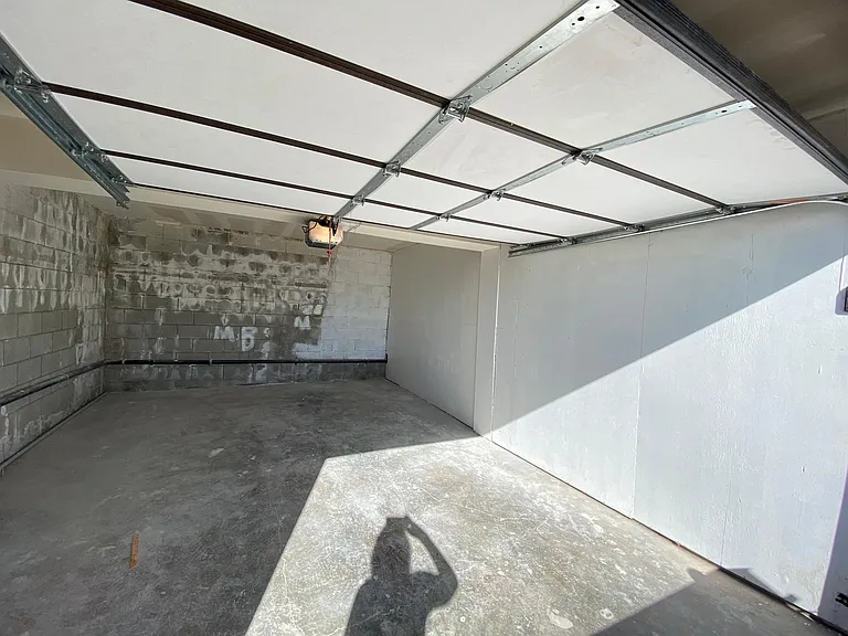 Large one car deep garage. Laundry hook ups in garage