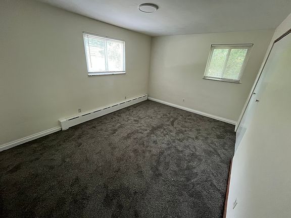 Front bedroom with attached bathroom, 11x14.