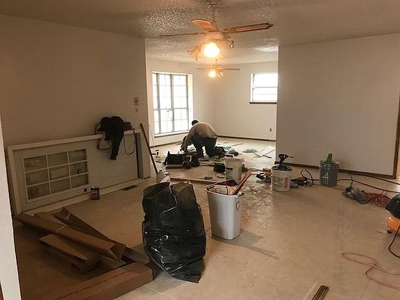 Another angle of living room and formal sitting room or offi