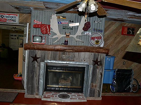 Walls and Fireplace are Made with Fence Board from Sealy, Texas.