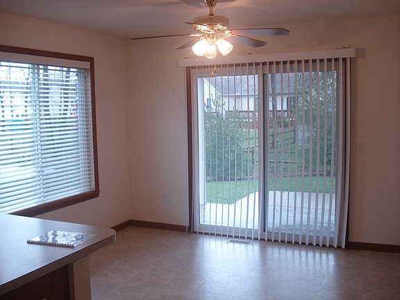 Kitchen eating area leads to patio