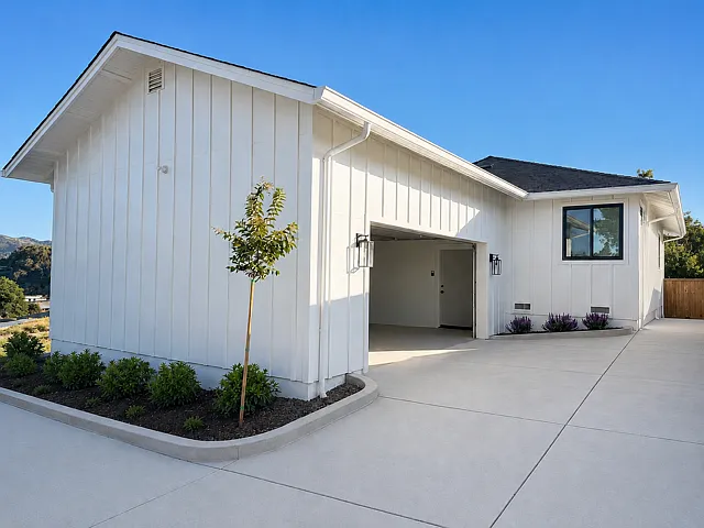 Attached 2-car garage with oversized driveway and ample off-street parking.