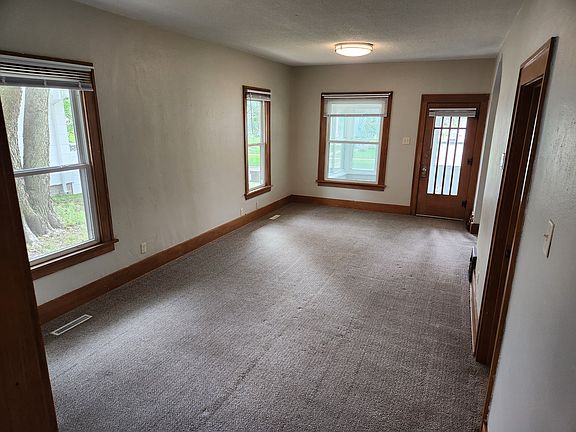 Living & dining area with tons of natural light.