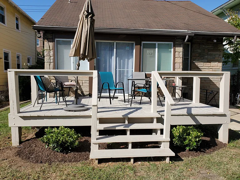 Backyard deck with BBQ grill. Relax, chat with friends, yoga stretch.