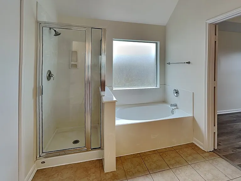 Brightly lit, spacious bathroo