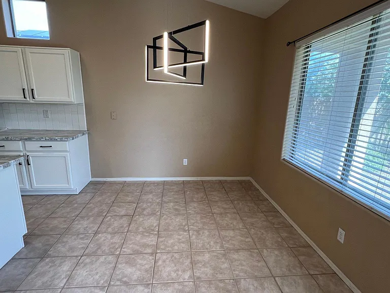 kitchen eating area with room for very large table or hutch or bakers rake for even more storage