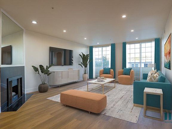 Living Room with Electric Fireplace, Recessed Lighting, Vinyl Flooring, and Patio