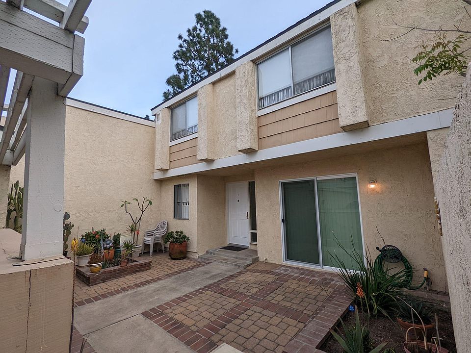 FRONT ENTRANCE with good size FRONT COURTYARD to relax or BBQ.