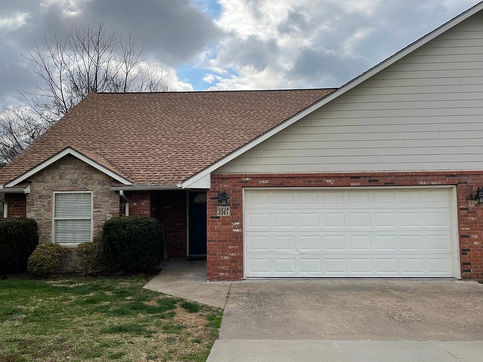 Street view of home and attached garage