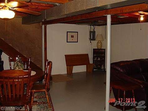 Very clean and organized full basement with washer & dryer and other utilities.