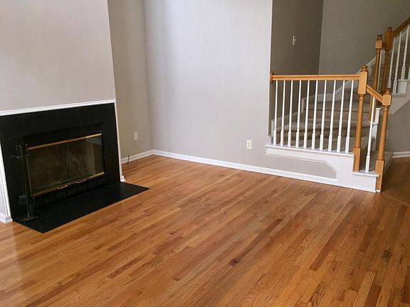 Living room with vaulted ceilings.