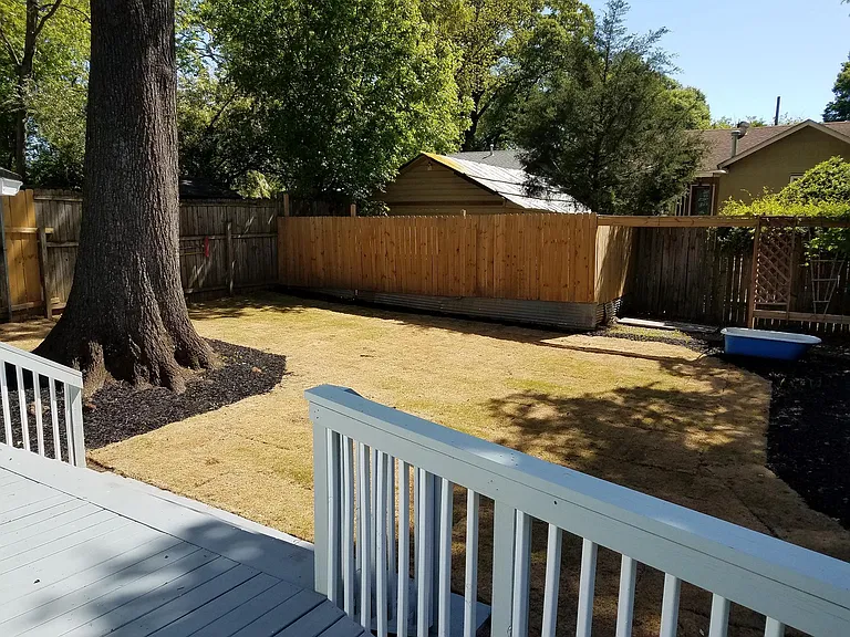 On deck, looking at backyard
