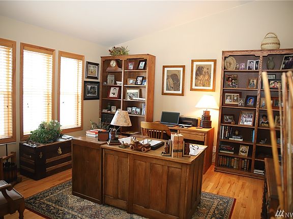 Vaulted ceilings and a propane fireplace make this living room the cozy place to sit and relax.