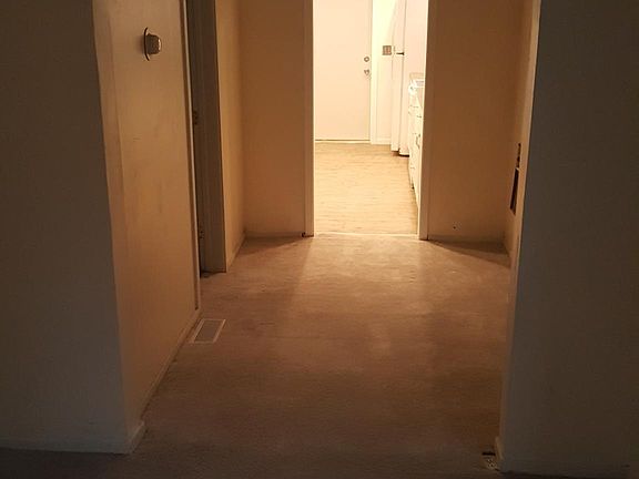 Looking from living room, through small dining room into kitchen.