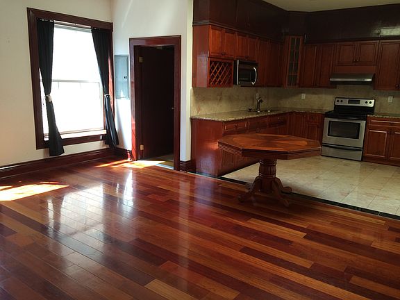 Another picture of the living room and kitchen.