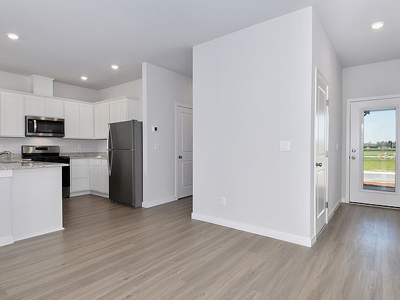 The kitchen is open to the family room.