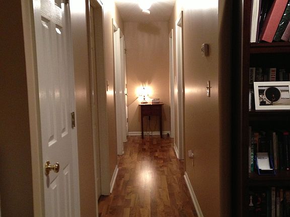 Hallway to three bedrooms