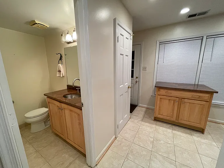 Part of kitchen and half bathroom