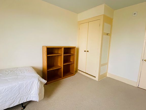 Room 11 bookshelf & closet