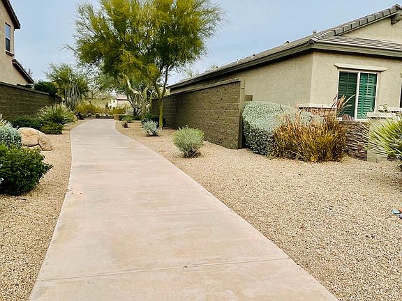 Walking path directly on the side of the house