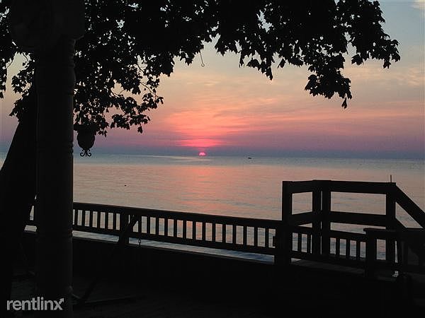 Sunrise from the 40 ft furnished deck...talk a beach walk &