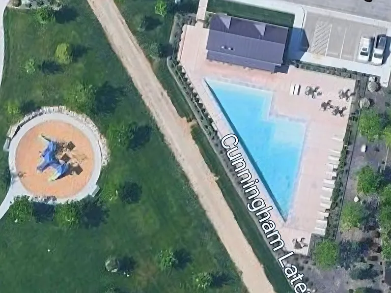 SATELITE VIEW OF UNIQUE MOUNTAIN SHAPED COMMUNITY POOL AND NEARBY H.O.A PARK.