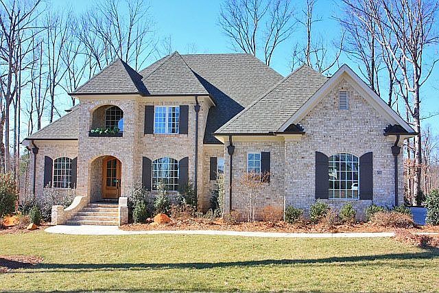 Fantastic ALL Brick home on the 16th Fairway of the Davis Love Golf Course