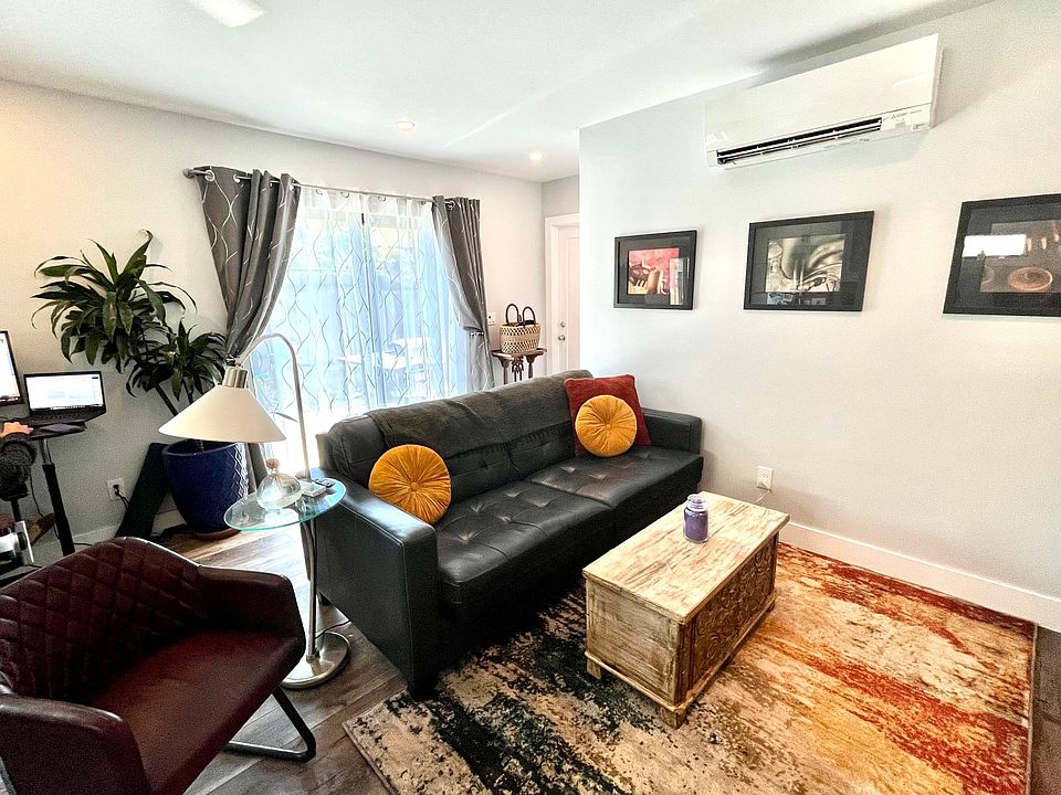 Lots of natural light, leather fold-out sofa (queen), adjustable desk, Steal-Case office chair