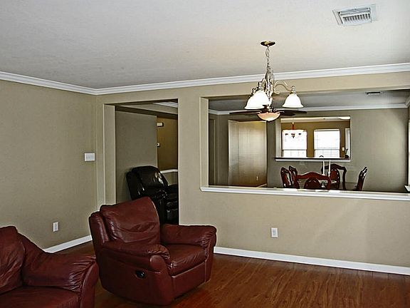 Warm Wood Laminate Floors are Throughout the Home.