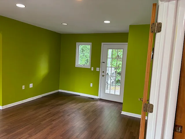 Family Room View from the Kitchen Leading to rear side of the house with an independent side entrance (see glass door)