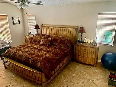 private master en-suite with high ceilings, pool view, 2 walk in closets
