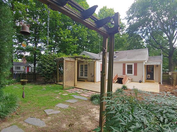 Large fenced in back yard with deck and basement for storage