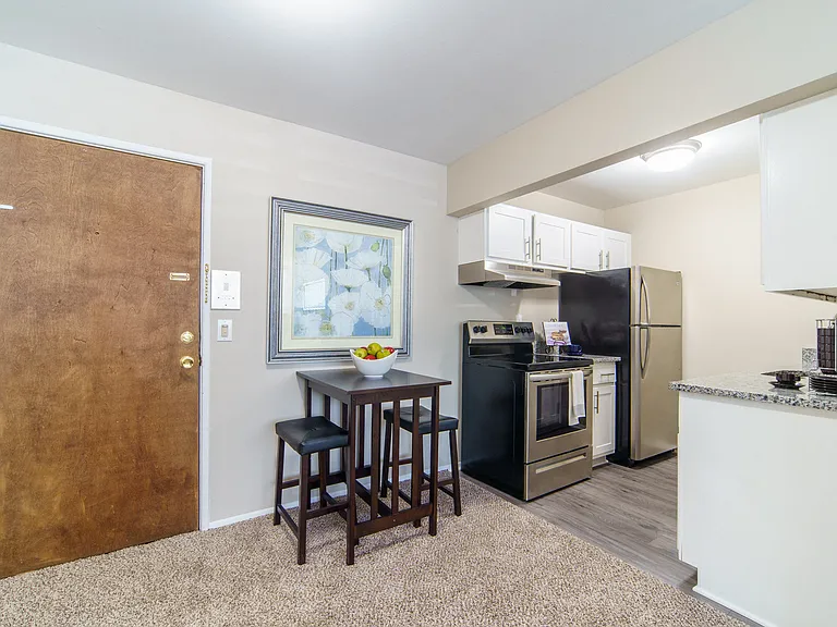 Living Area Looking Into Renovated Kitchen
