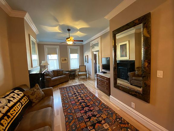 First floor living room with a 50" TV