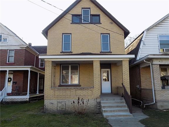 Exterior Front With Welcoming Front Door
