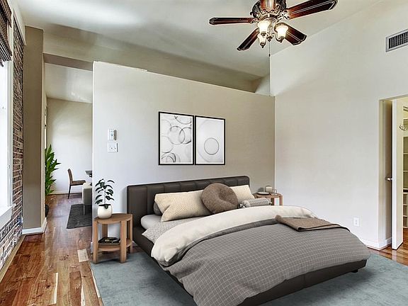 Virtually staged photo of the master bedroom.