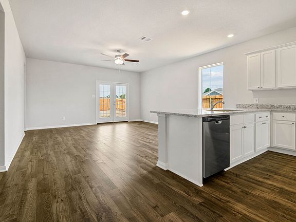 The kitchen comes with granite countertops and stainless steel appliances!