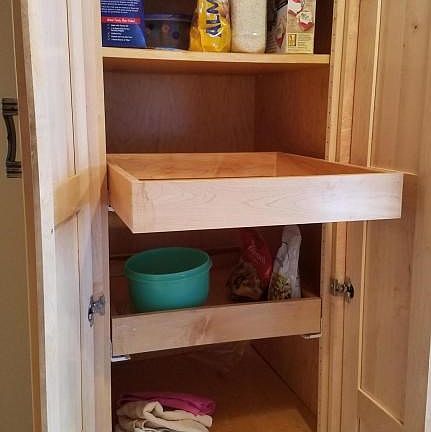 Cabinetry with pull out drawers