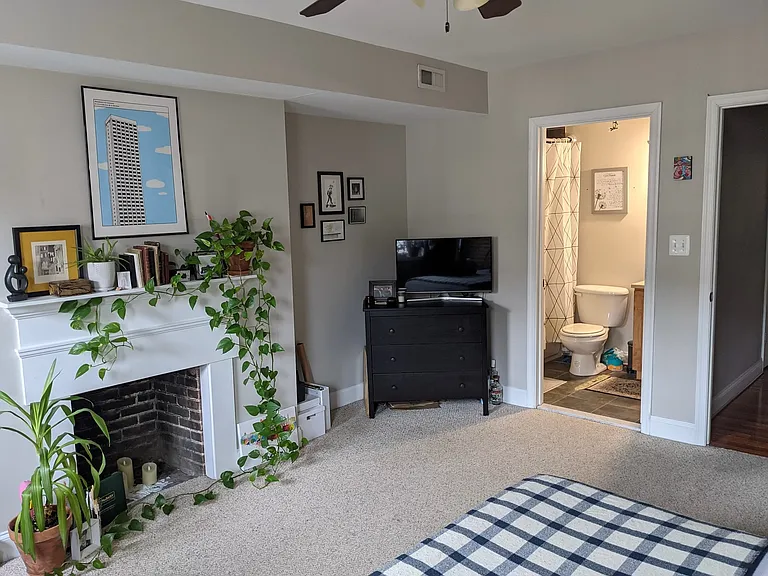 Bedroom 3 has a cute decorative fireplace, too.