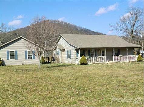 Covered front porch with a grand view of the mountains!