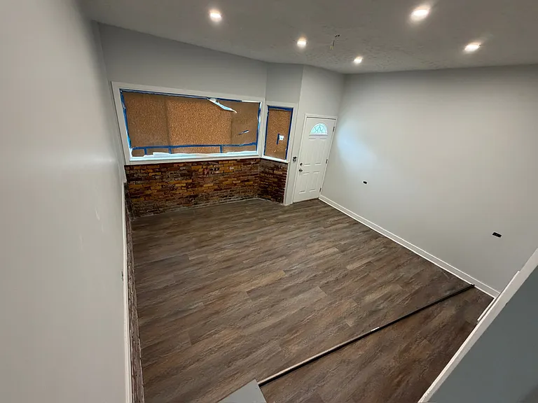 In final stages of renovation - Large great room with brand new windows & lots of natural light