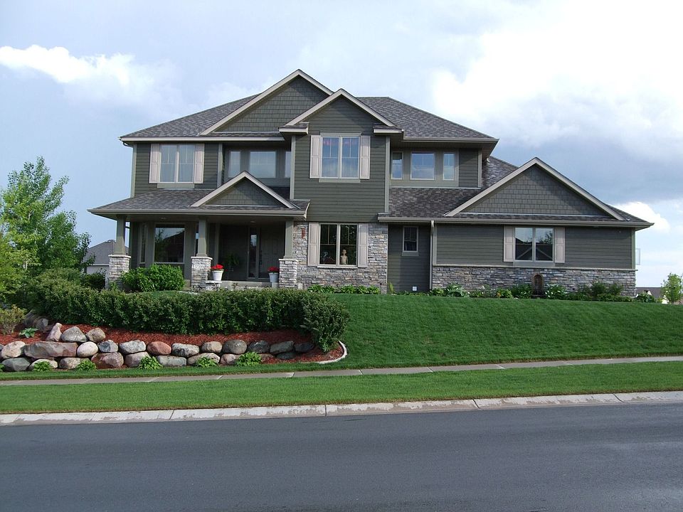 Impressive Curb Appeal with perennial plantings and many trees!